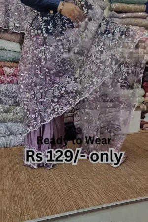 Elegant Purple Net Saree with Intricate Design